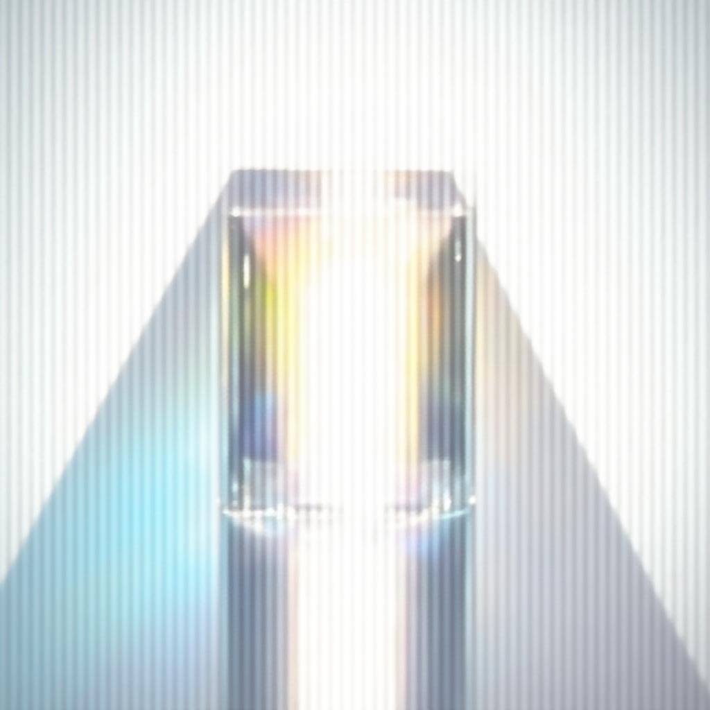 Abstract light passing through a glass prism creating a spectrum of clarity